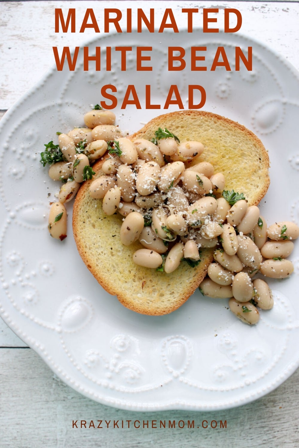 This Marinated White Bean Salad is simple and satisfying and comes together in just minutes. It's a combination of creamy white beans with fresh herbs and olive oil.  via @krazykitchenmom