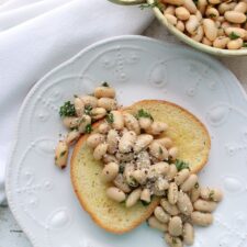 White bean salad on a slice of toast