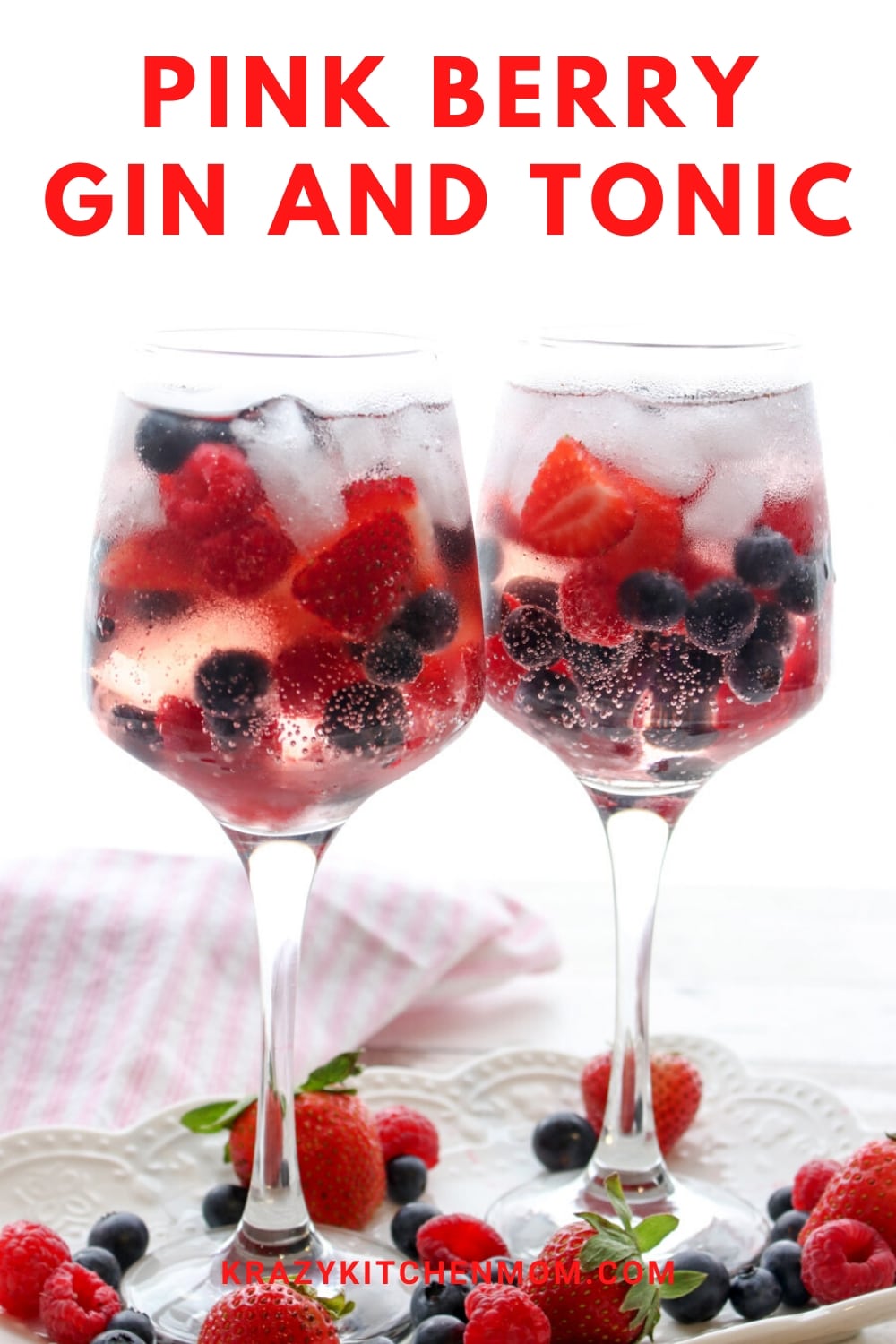 Pink Berry Gin and Tonic is a refreshing cocktail made with Pink Gin and filled with fresh strawberries, raspberries, and blueberries served over ice.  via @krazykitchenmom