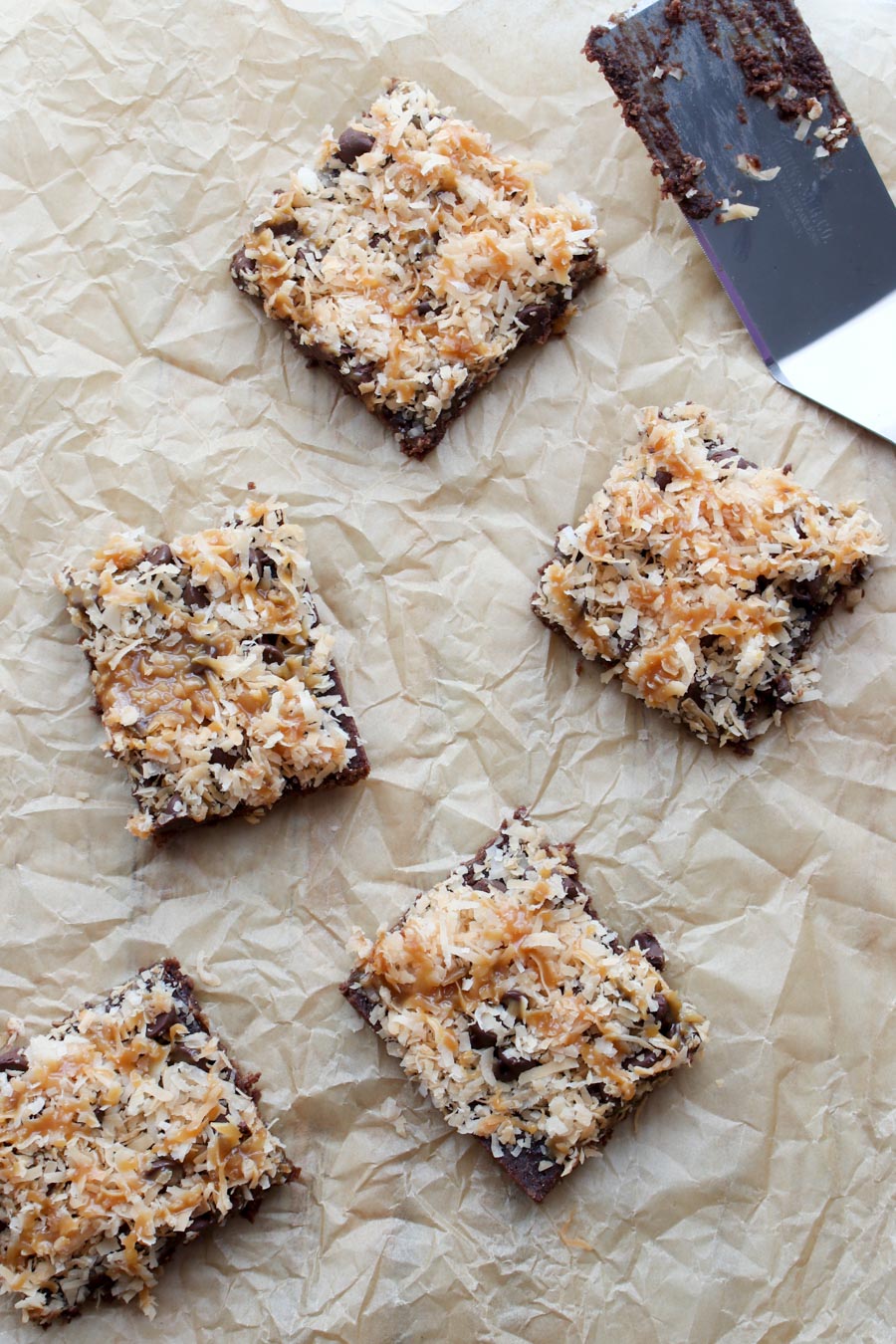 Caramel Coconut Samoa Brownies on a piece of parchment paper