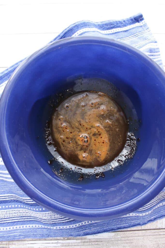 Bowl of instant coffee, sugar, and water