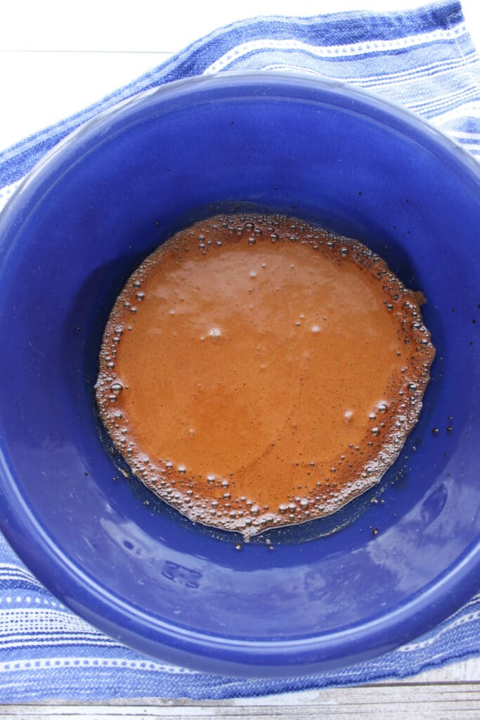 Bowl of water, coffee, and sugar whipped for 2-3 minutes.