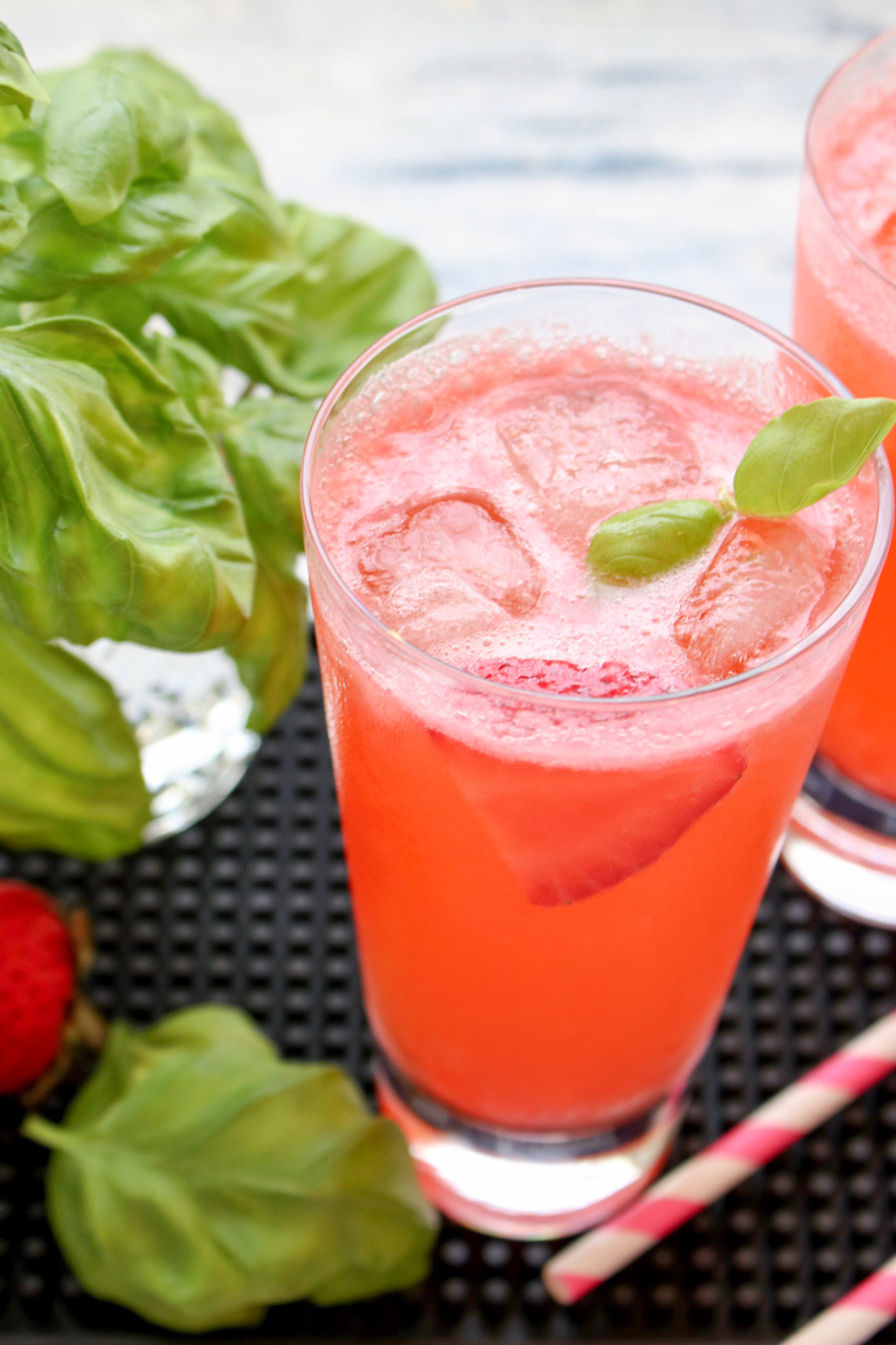 Overhead shot looking into a the strawberry gin and tonic cocktail