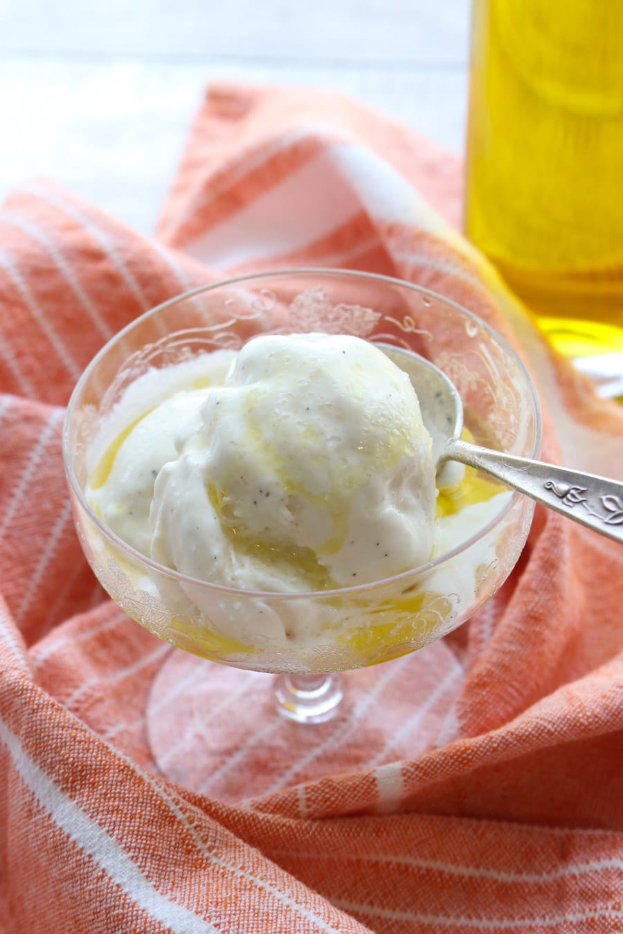Dish of Vanilla ice cream with olive oil and sea salt