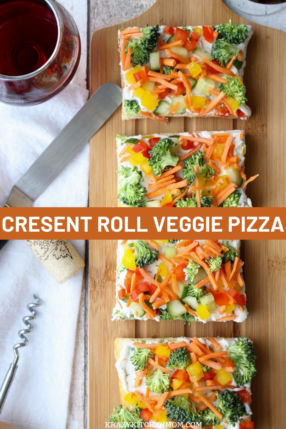 A flakey crust topped with creamy herby dill dip and topped with fresh vegetables. It's perfect for a light lunch or a party appetizer any time of the year. via @krazykitchenmom