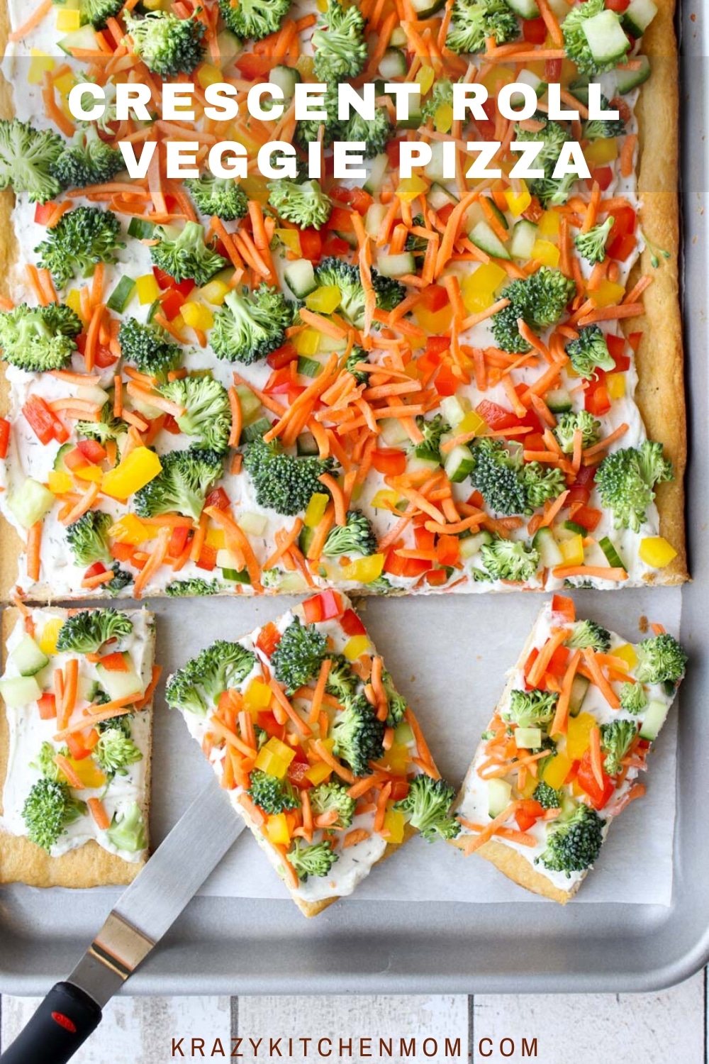 A flakey crust topped with creamy herby dill dip and topped with fresh vegetables. It's perfect for a light lunch or a party appetizer any time of the year. via @krazykitchenmom