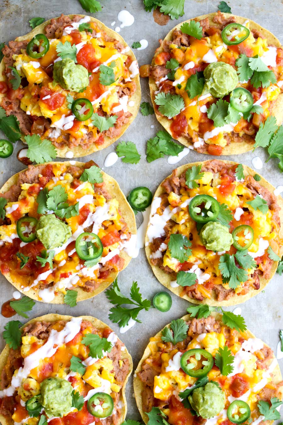 breakfast tostadas on a cookie sheet