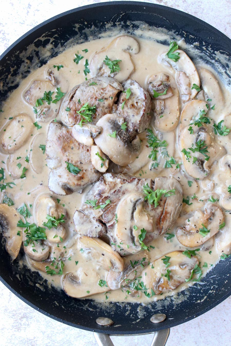 Filet Mignon with Boursin Mushroom Sauce  in a skillet