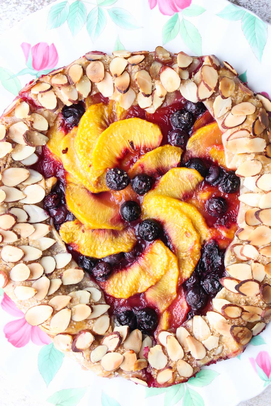 Close up of the baked peach and blueberry galette