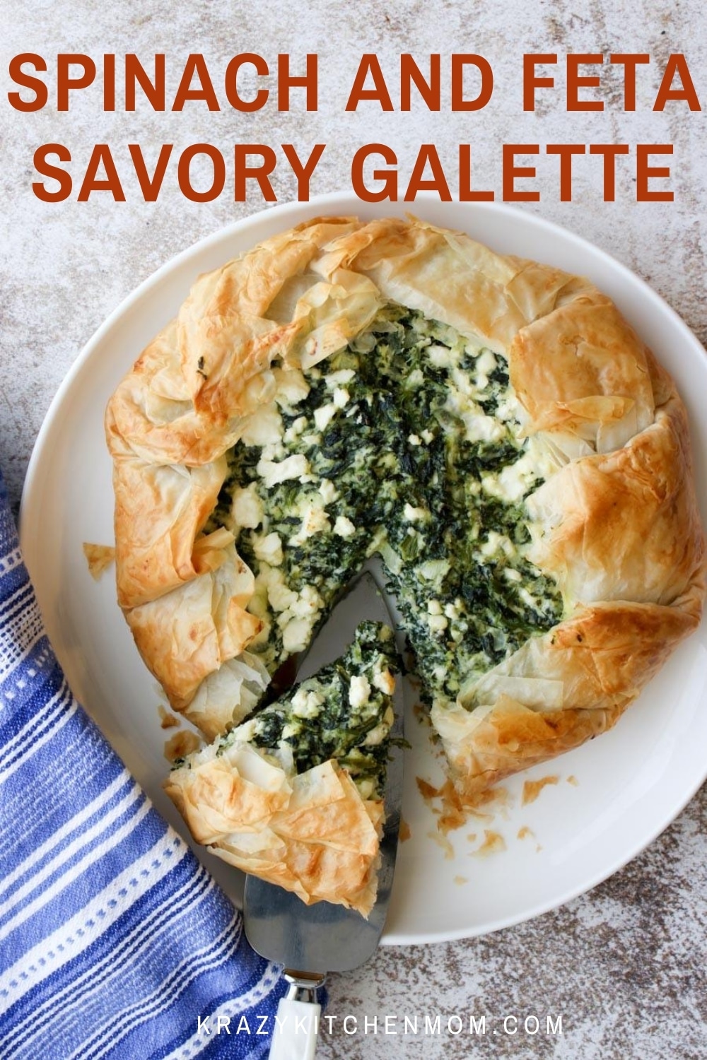 A beautiful buttery rustic Greek pie (Spanakopita) filled with spinach, onions, ricotta, and feta cheese baked to crusty, creamy, fluffy perfection. via @krazykitchenmom