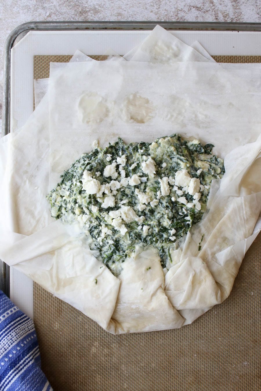 showing how to assemble the spinach galette