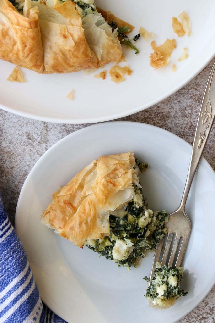 close up shot of one slice of spinach galette