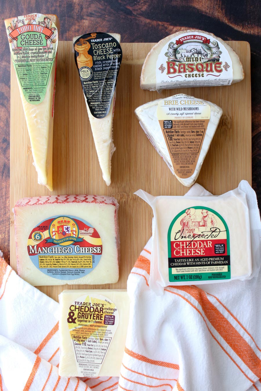 Seven types of cheeses in their packaging