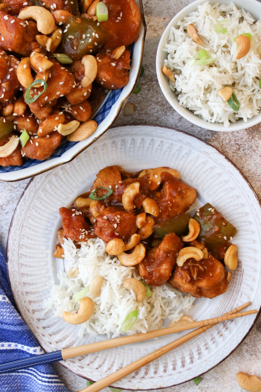 A serving of cashew chicken with white rice