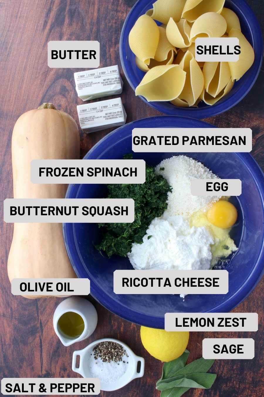 cookie sheet with all of the ingredients needed to make butternut squash stuffed shells