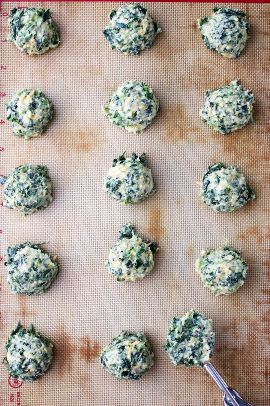 Cookie sheet with spinach balls