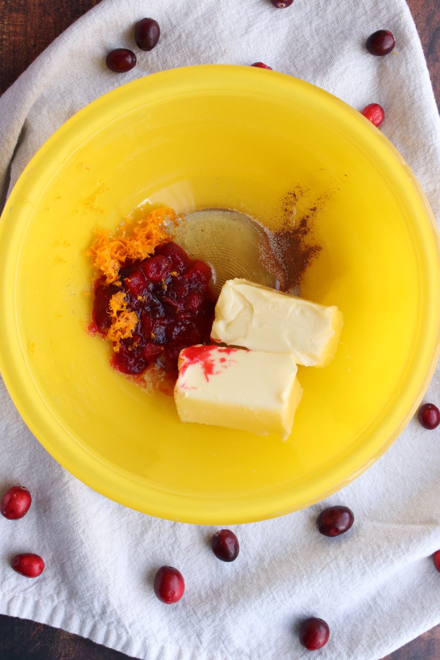 Cranberry butter ingredients in a yellow bowl