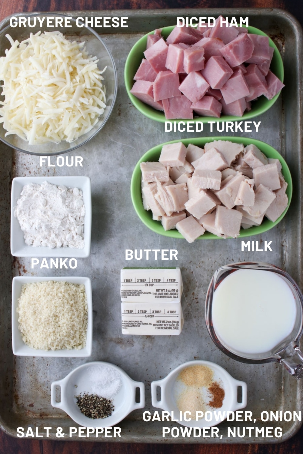 Cookie sheet with the ingredients to make turkey condon bleu casserole 