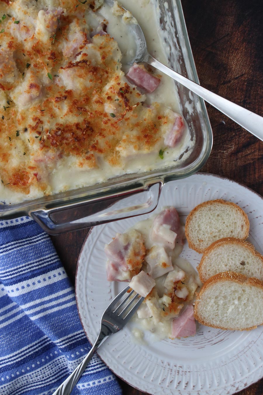 turkey cordon bleu casserole  on a dish with the casserole sitting next to it