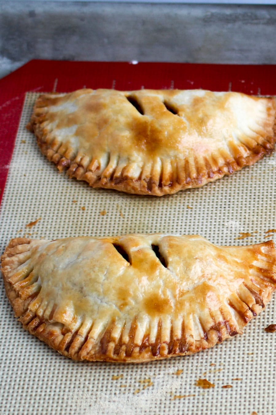 two baked empanadas