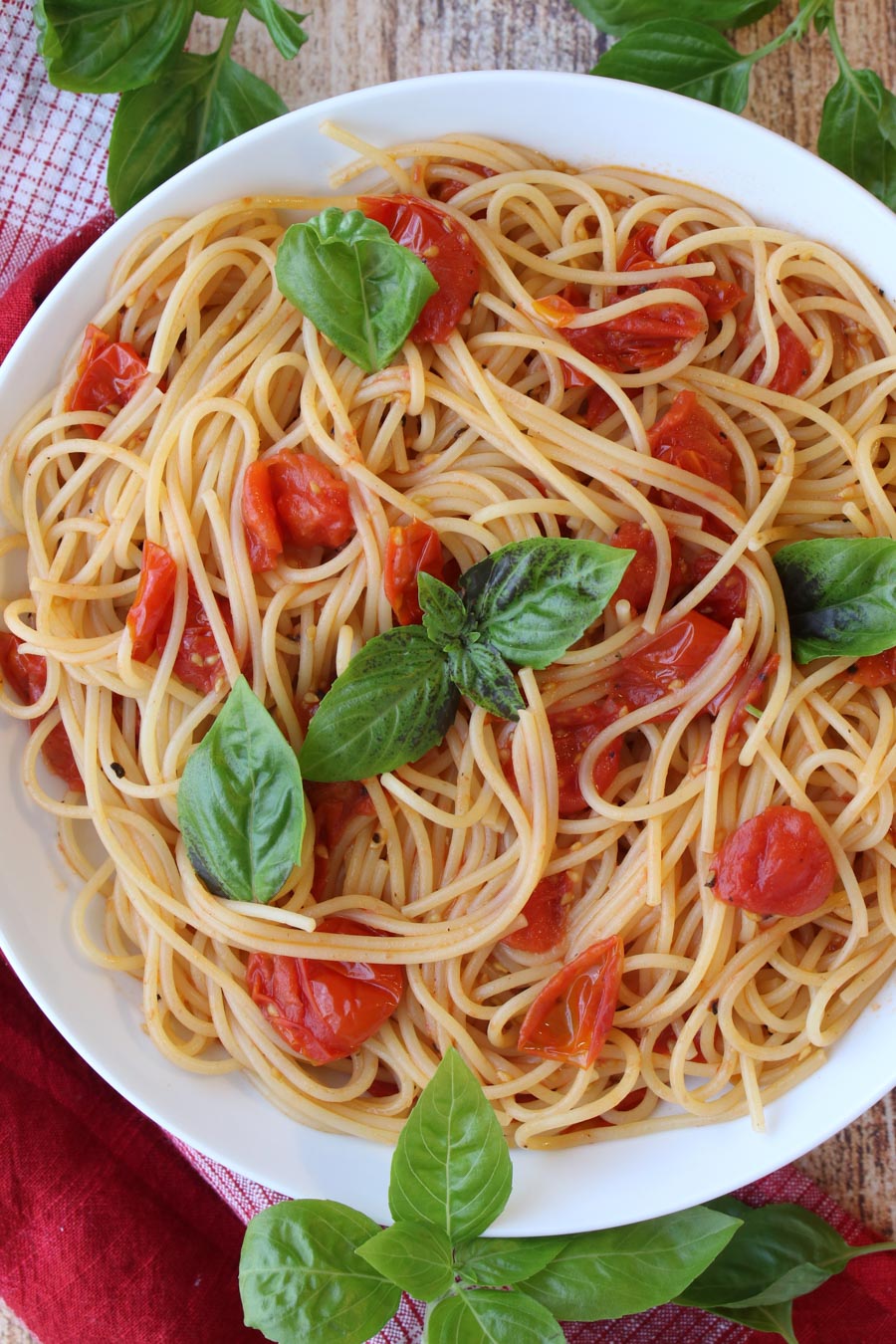 Bowl of pasta with tomatoes and fresh basil