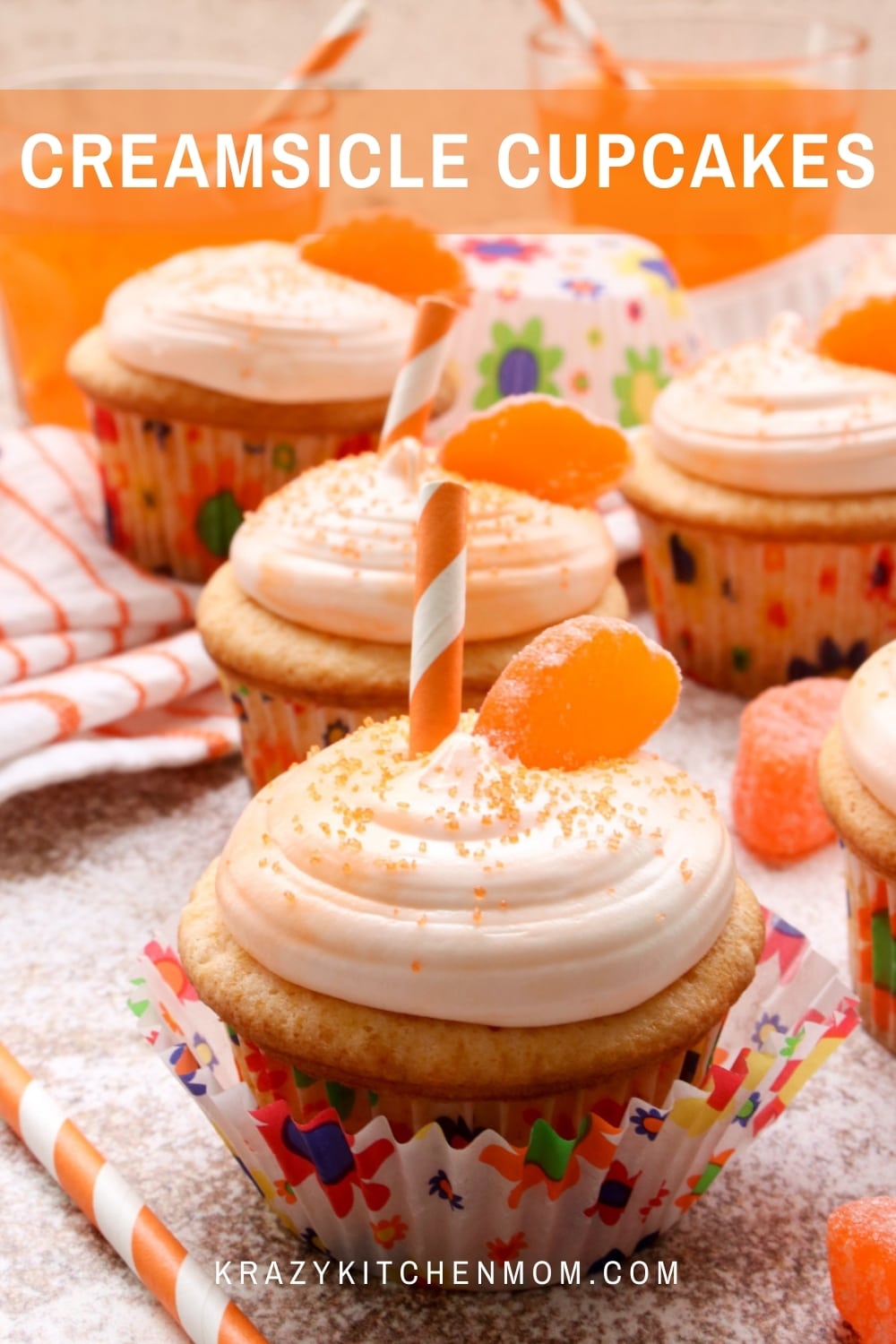 Soft, light, fluffy orange creamsicle cupcakes are made with orange soda pop and topped with creamy marshmallow frosting. via @krazykitchenmom