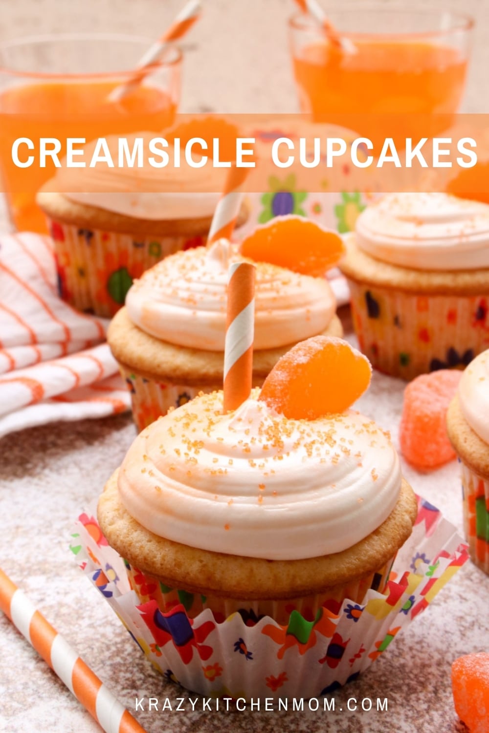 Soft, light, fluffy orange creamsicle cupcakes are made with orange soda pop and topped with creamy marshmallow frosting. via @krazykitchenmom