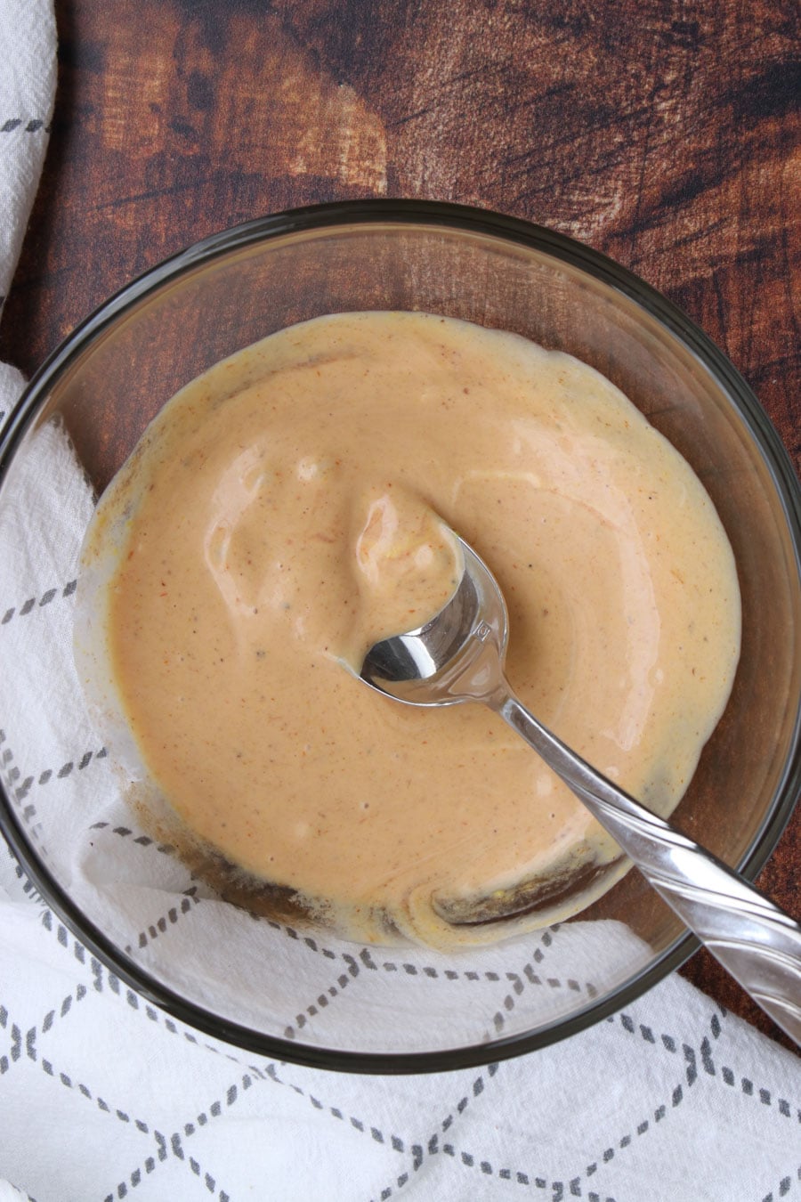 Bowl of special sauce for cheeseburger sliders