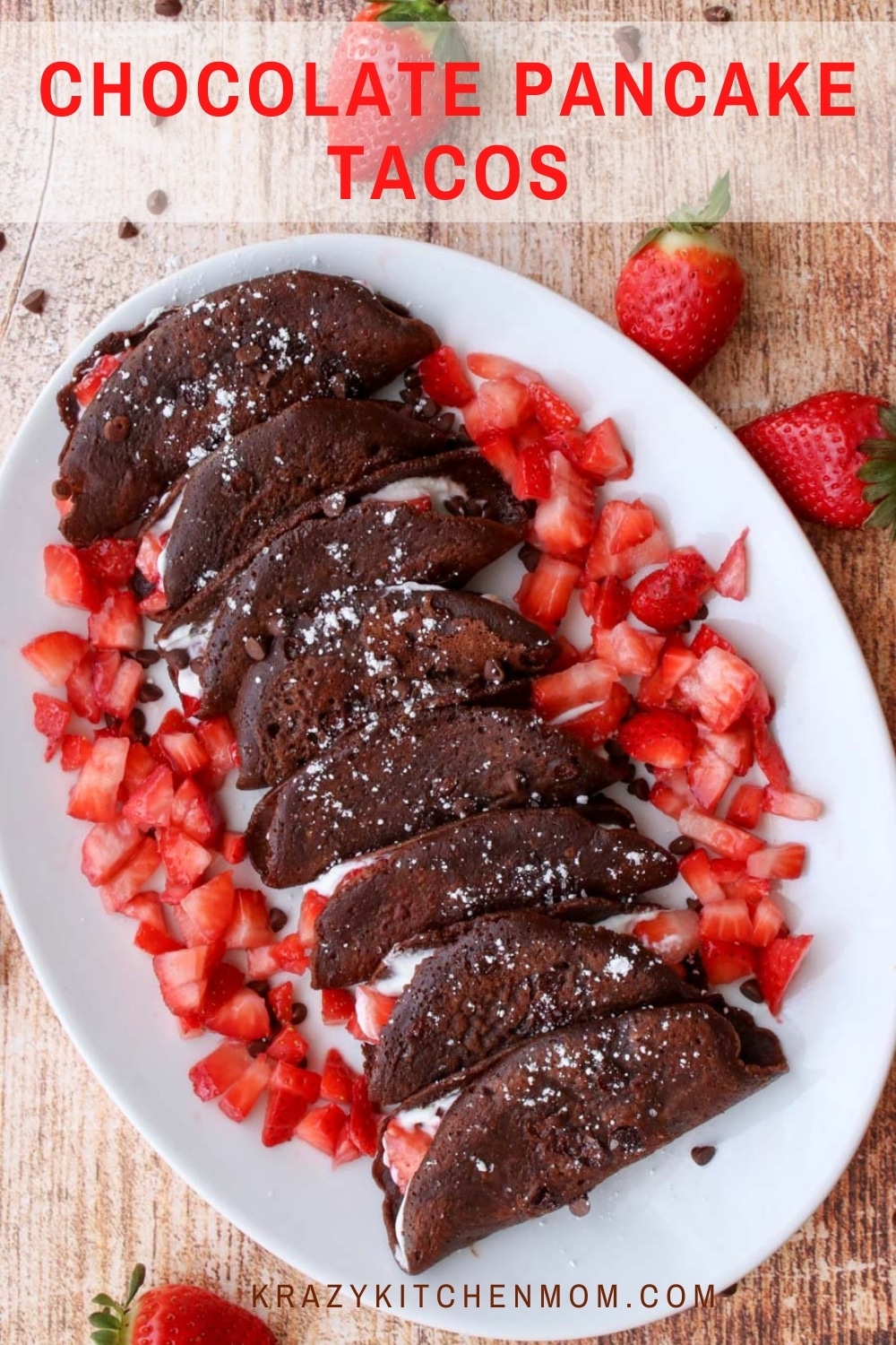 Calling all chocolate lovers! You will want to jump out of bed for these chocolatey strawberries and cream-filled pancake tacos. via @krazykitchenmom