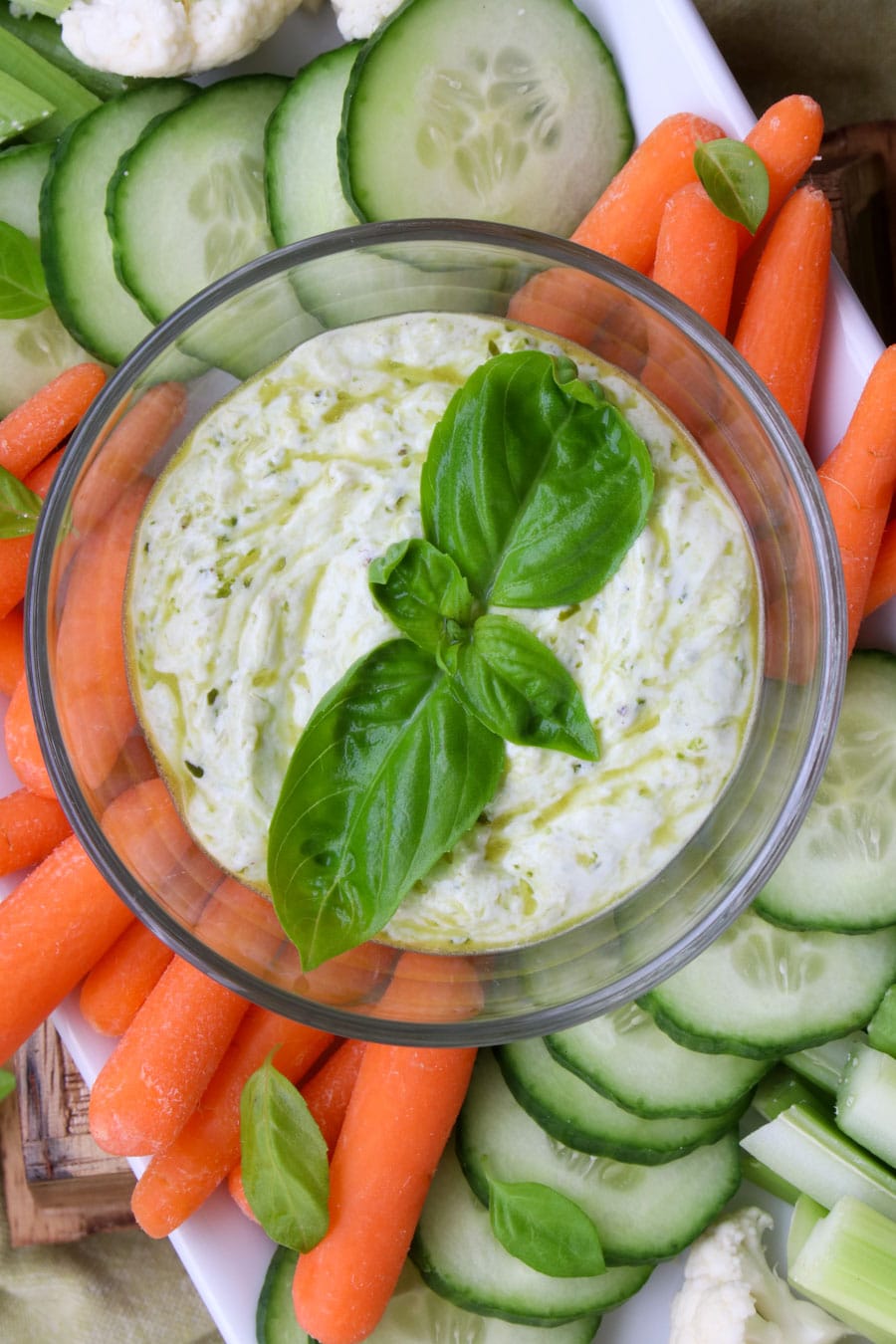 close up shot of a bowl of pesto yogurt dip