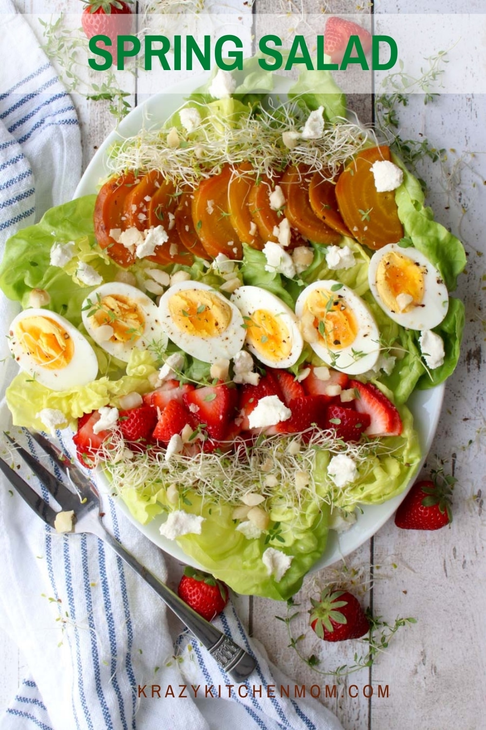This fresh spring salad filled with soft crispy butter lettuce, strawberries, beets, hard-boiled eggs, and goat cheese will brighten any salad lover's day. via @krazykitchenmom