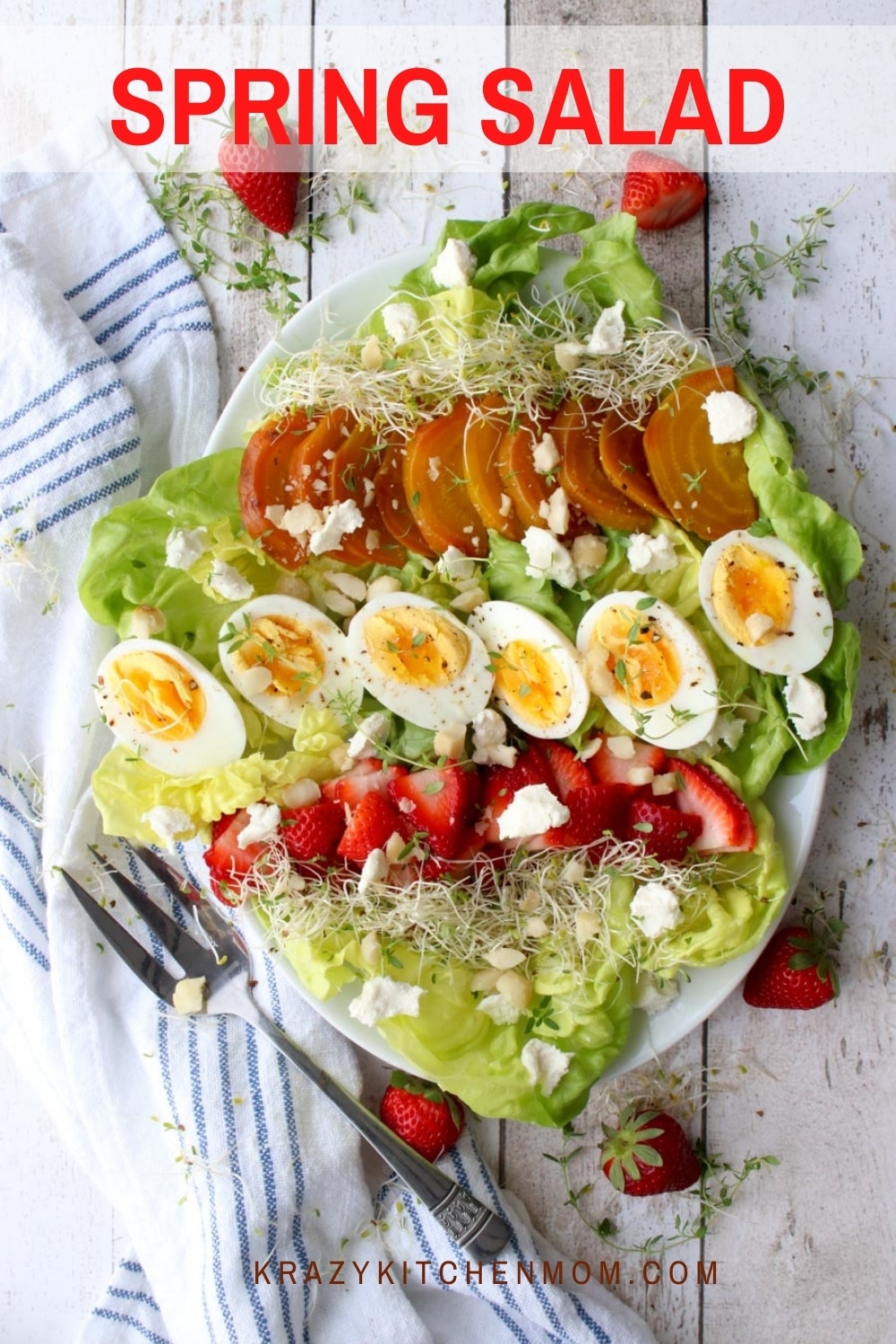 This fresh spring salad filled with soft crispy butter lettuce, strawberries, beets, hard-boiled eggs, and goat cheese will brighten any salad lover's day. via @krazykitchenmom