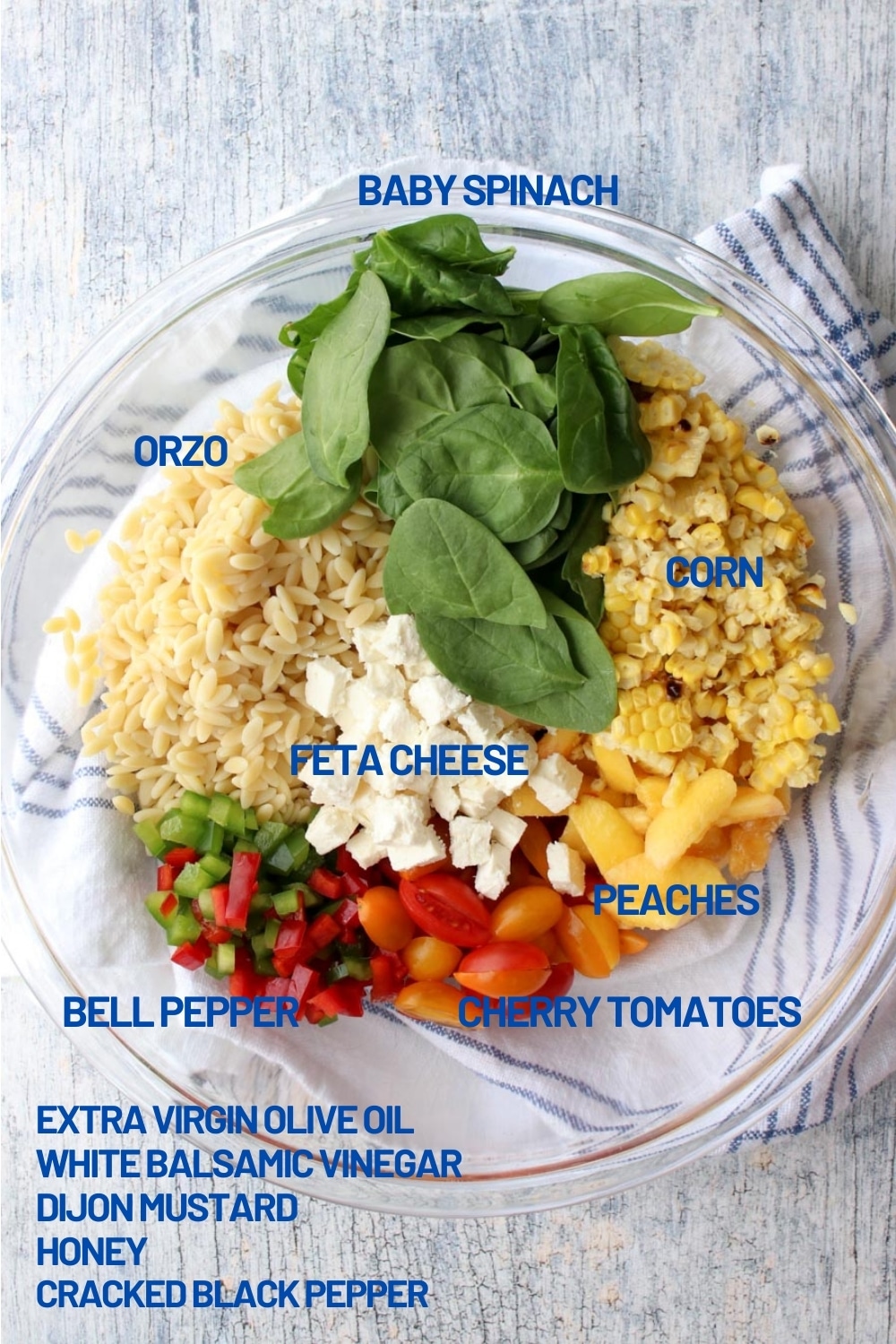 large bowl of orzo salad ingredients