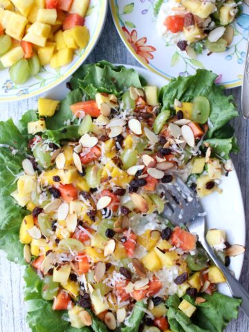 platter of tropical cottage cheese and a plate of fruit on the side