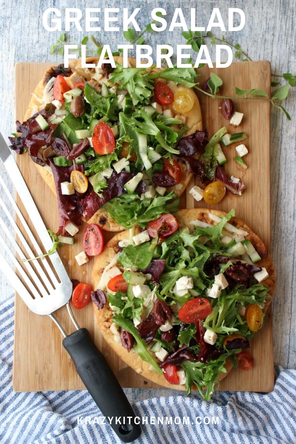 This is the best of both worlds - pizza and salad. A bright flavor-packed Greek salad on top of a flatbread covered in melted cheese and diced chicken. via @krazykitchenmom