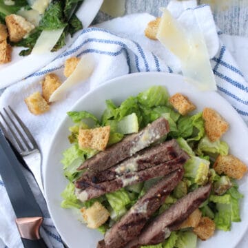 Steak Salad a round white plate