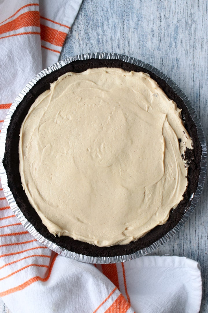 peanut butter pie filling in chocolate pie shelll