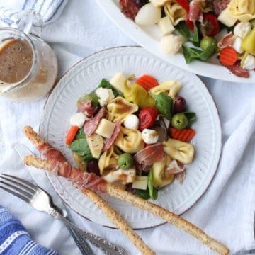 antipasto salad on a small round plate