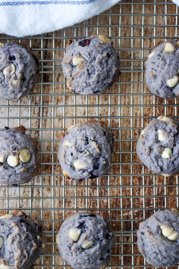 cooling rack with purple blueberry cookies