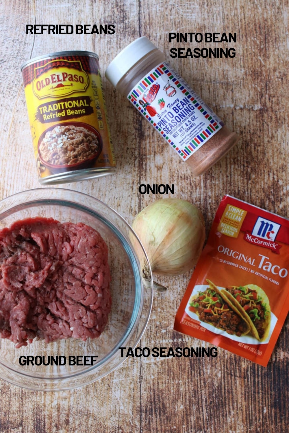 Ingredients to make taco beef and refried beans