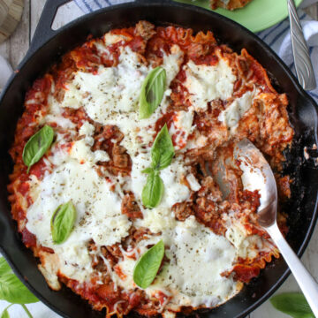 SKILLET PF LASAGNA WITH LARGE SPOON