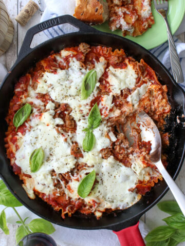 SKILLET PF LASAGNA WITH LARGE SPOON