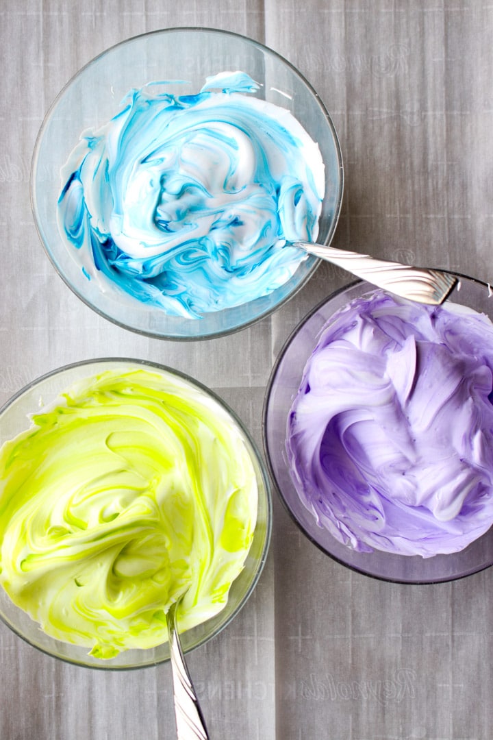 blue, neon green, and purple colored meringue