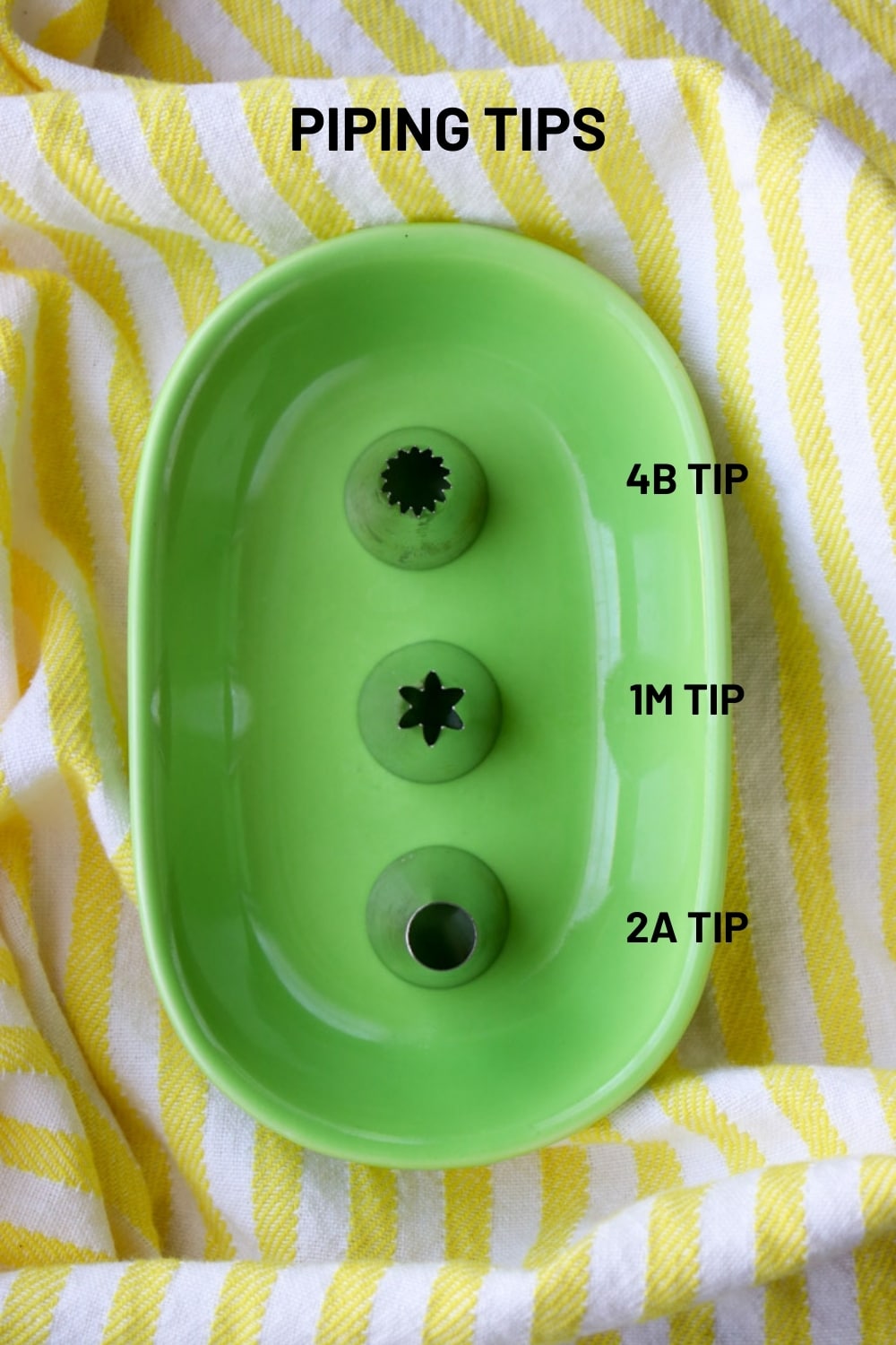 three different piping tips in a green dish