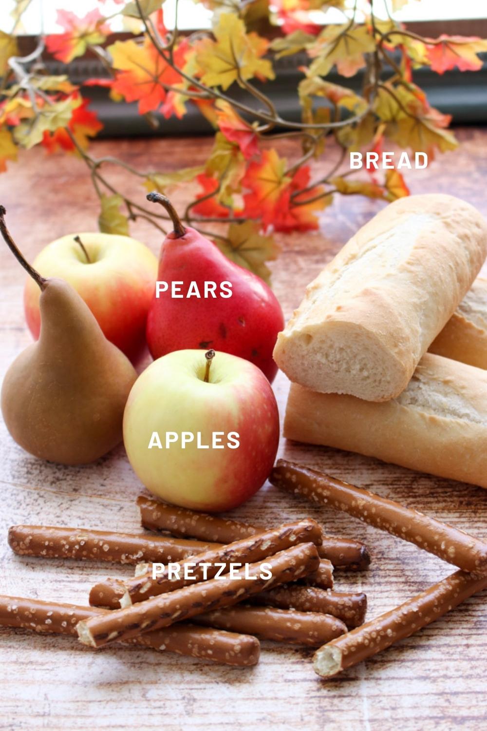 2 apples, 2 pears, baguette, several pretzel rods