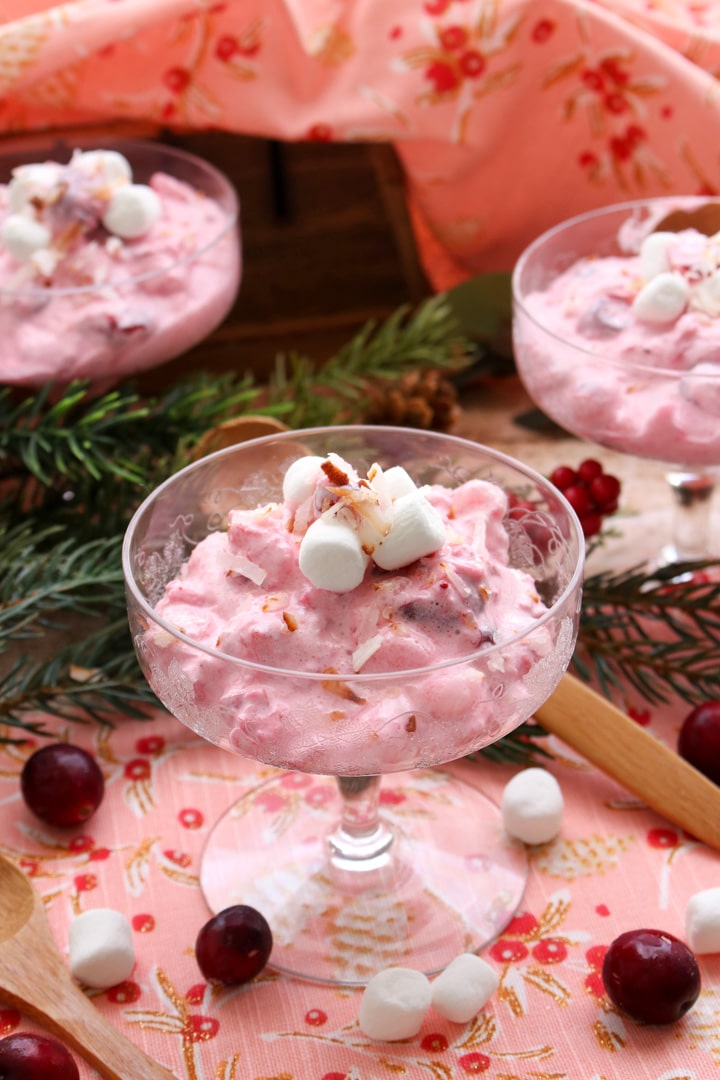 Three decorative dishes of cranberry ambrosia