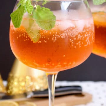 aperol spritz cocktail with a black background