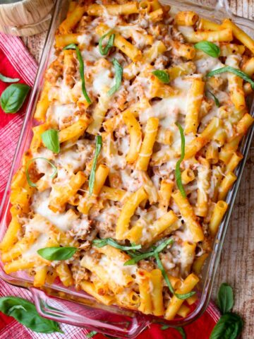 overhead shot of a casserole dish filled with baked ziti