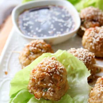 chicken meatball on a lettuce leaf