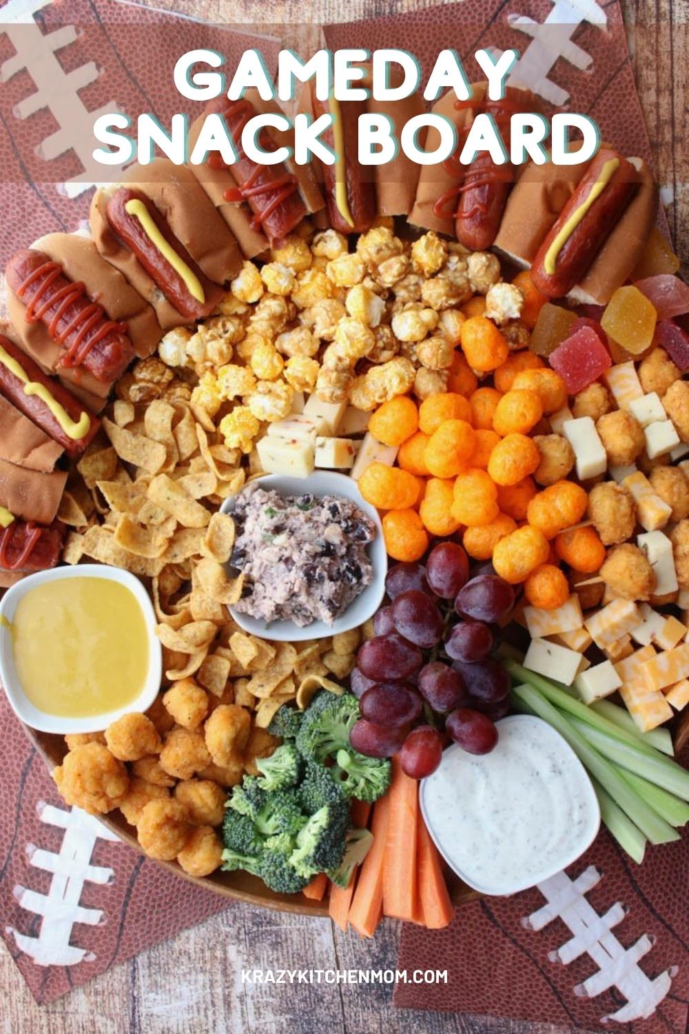 This Game Day Snack Board is a charcuterie board gone casual. It's filled with family-fun snacking finger foods that everyone loves. via @krazykitchenmom